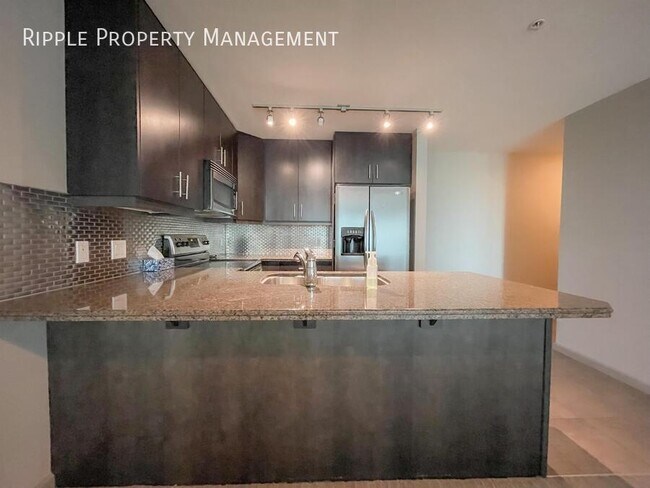 Building Photo - Amazing 2 bedroom 2 bathroom condo in Vetro | Age Restriction Applies