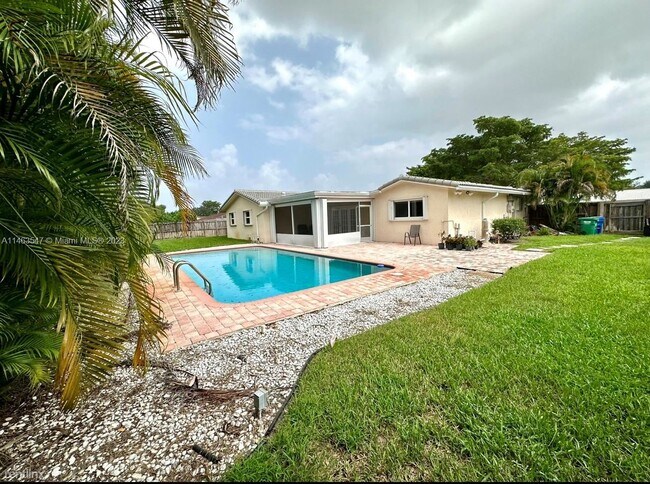 Foto del edificio - 5 br, 2 bath House - 2940 NW 115th Ter