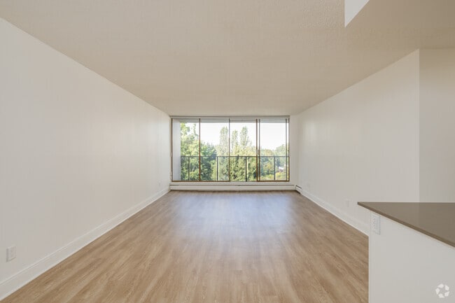 3BR, 2BA - 1,262SF - Living Room - Lougheed Village - Lougheed Lodge