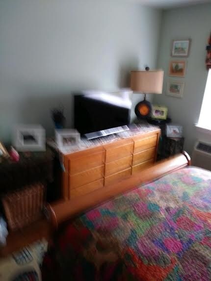 Part of the king-size bedroom. - 11 Harbour Ln