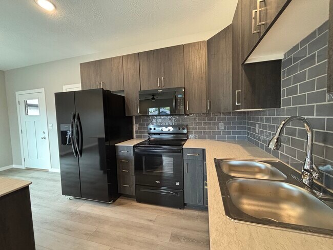 Foto del edificio - 4940 W Minota St