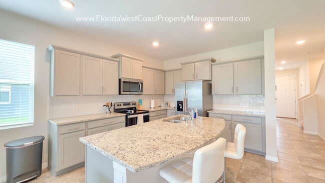 Building Photo - OUTSTANDING CORNER TOWNHOME  3 Bedroom/2.5 BATH PLUS FLEX- BONUS! SUPER LOCATION TO WATERSIDE- SA...