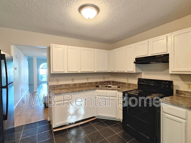 Building Photo - 5145 Glen Alan Ct N