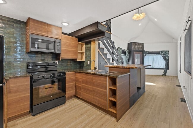 Building Photo - Modern 1-Bedroom Loft in Bay View – Updated Single Family Home with Parking!