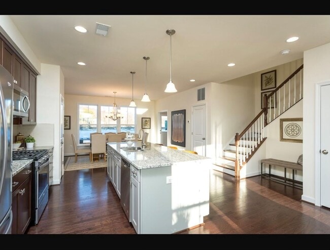 Building Photo - Luxury Townhouse With Detached Two Car Gar...