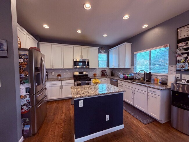 Building Photo - Entertainer’s Dream Near Southlands with Home Theater & Backyard Oasis
