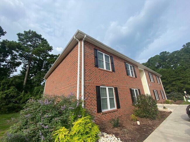 Building Photo - Stress-Free Beach Living with our pet frie...