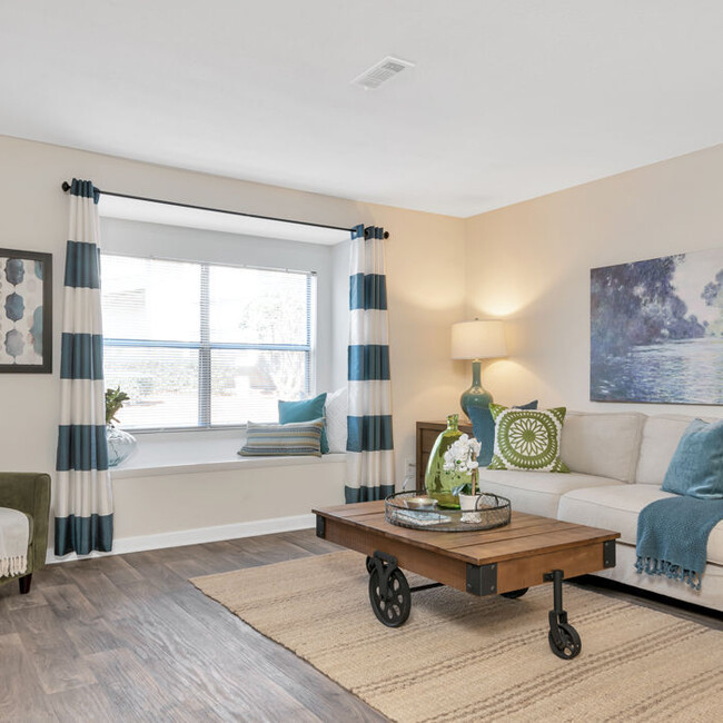 Deluxe Living Room with Bay Window - Forest at Chasewood