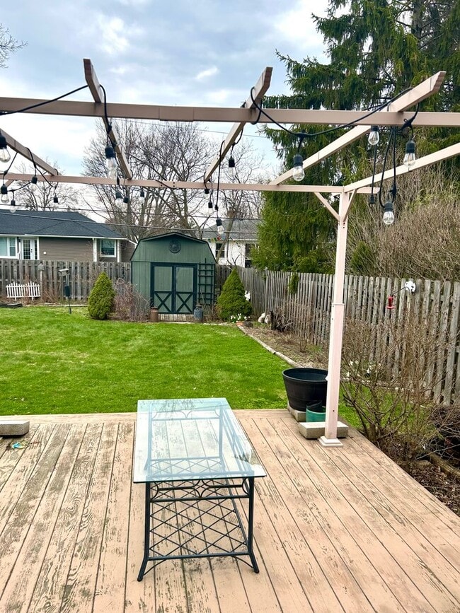 Building Photo - Sunroom Retreat | Fully Furnished 3BR with Private Fenced Yard
