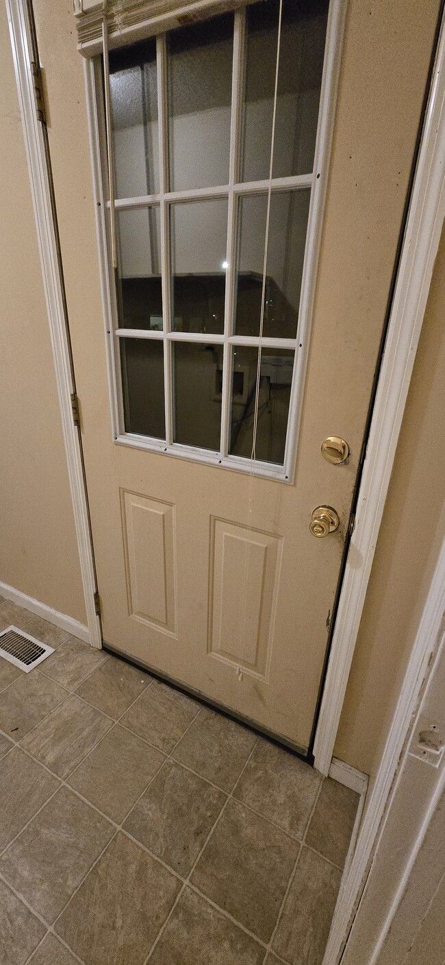 carport entrance to laundry rm - 103 N Roosevelt St