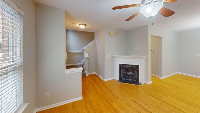 Building Photo - Experience urban living in this stylish to...
