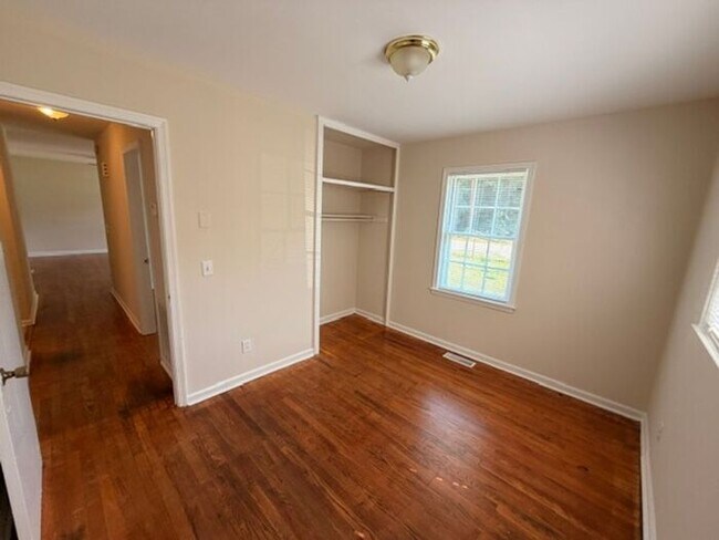 Building Photo - Three bedroom brick home available now!