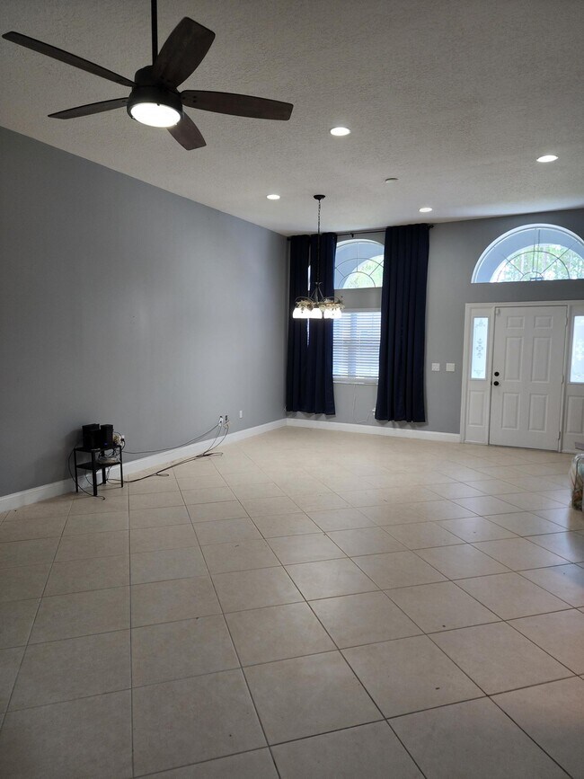 OPEN DINING AREA CONNECTED TO LIVING ROOM - 64 Pony Express Dr
