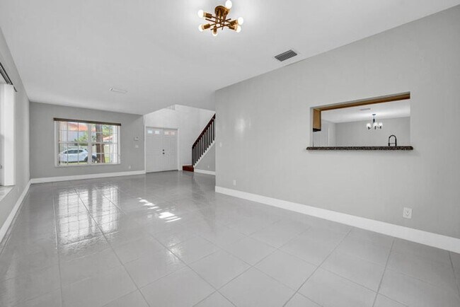 Foto del edificio - 10820 Buttonwood Lake Dr