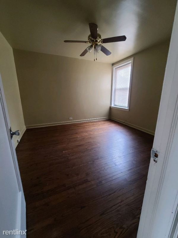 Building Photo - 2 br, 1 bath Apartment - 7147 S Cornell Ave