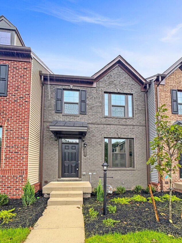 Primary Photo - Spacious 3-Bedroom Townhome with Finished ...