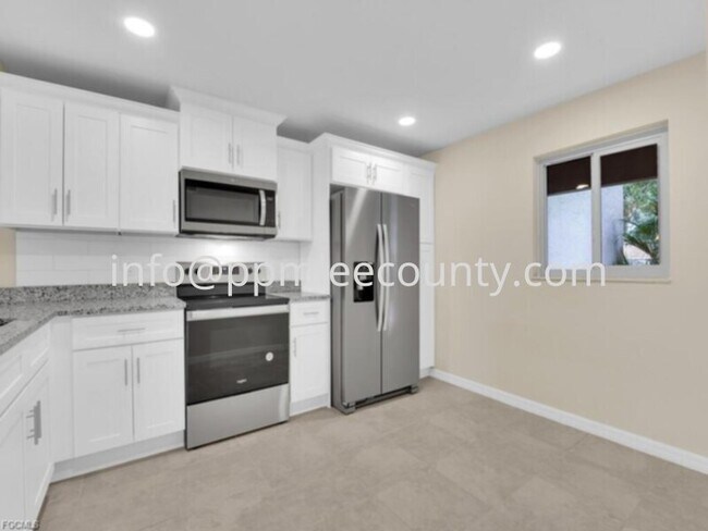 Building Photo - Completely renovated first floor 2 bedroom 2 bath condo in the wonderful community of Partridge Plac