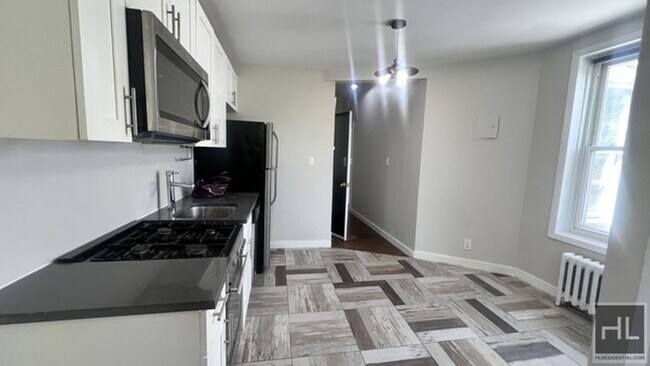 Foto del edificio - 1129 Rogers Ave