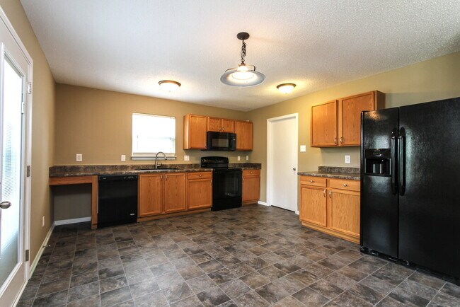 Foto del edificio - 13323 N Brick Chapel Dr