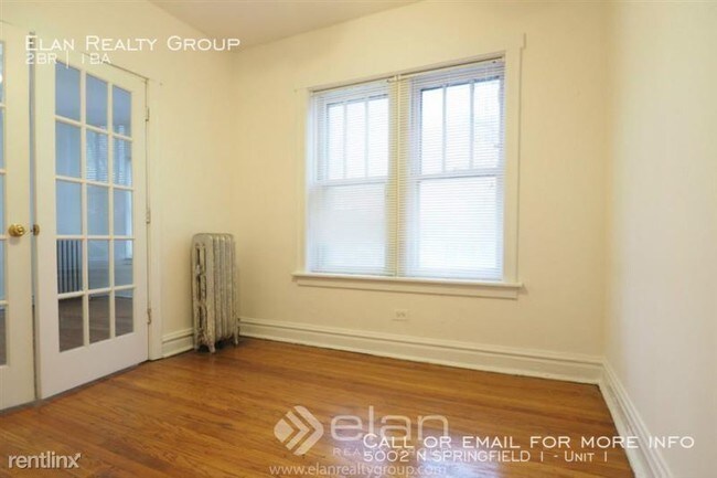 Building Photo - 5002 N SPRINGFIELD 1