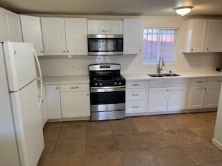 Remodeled kitchen with tile floor - 3727 46th St
