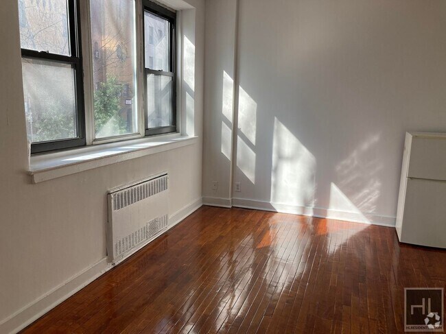 Building Photo - NO FEE Studio in Lenox Hill! Won't Stay on...