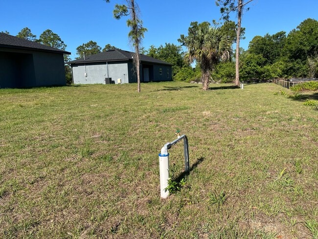 Building Photo - Brand New Home-GREAT LOCATION LEHIGH ACRES