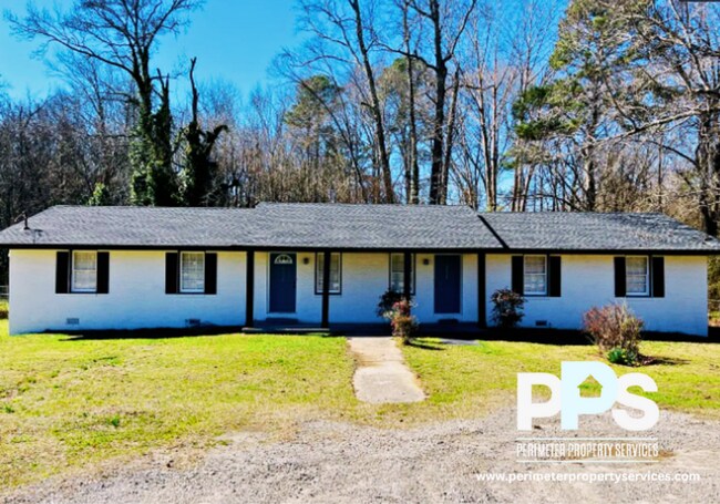 Foto del edificio - 6127-6129 E Fayetteville Dr