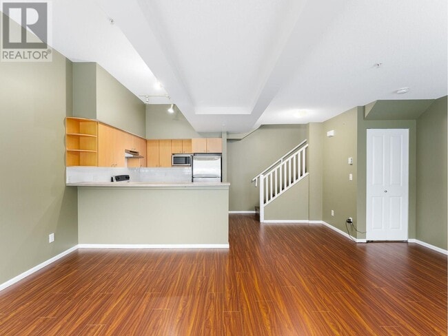 Building Photo - 7088-7088 17th Ave