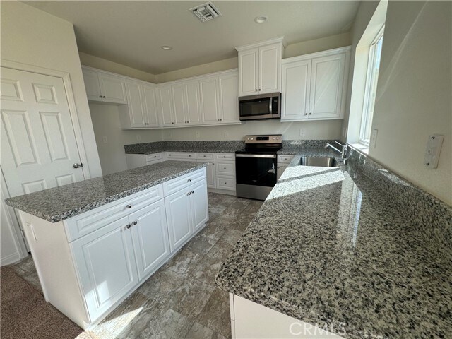 Building Photo - 26953 Checkers Dr