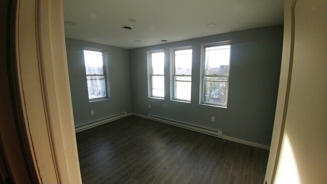 View from bedroom door to front of bedroom - 1655 S Newkirk St