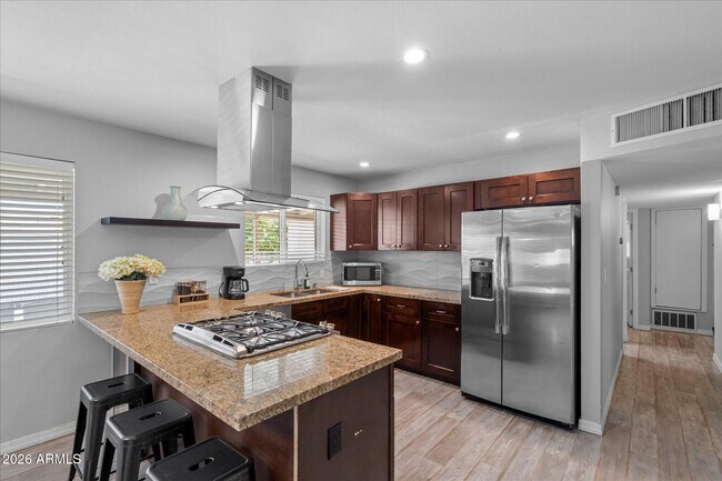 Foto del edificio - 7419 E Belleview St