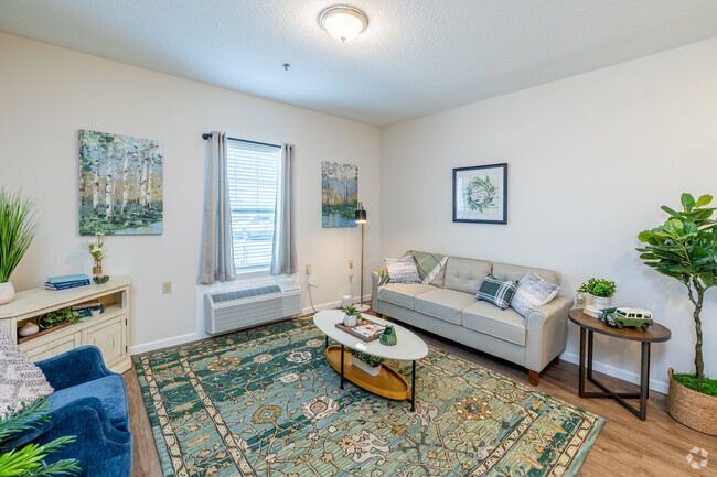 The Audrey - 1BD, 1BA - 622SF - Living Room - Homestead Village Fort Wayne - Active Livi...