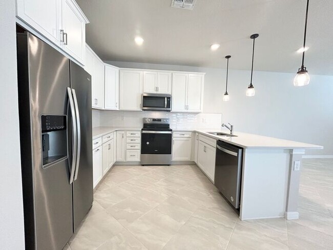 Building Photo - Brand New 4/3 Modern Townhome with a Priva...