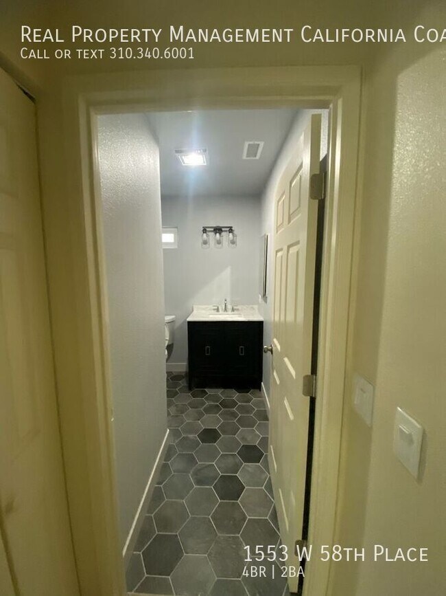 Foto del edificio - 1553 W 58th Pl