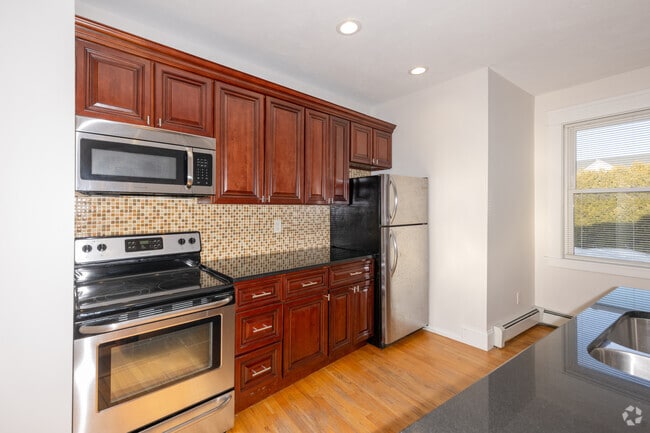 1BR, 1.5BA - 1,300SF - Kitchen - 98 Knight St Apartments