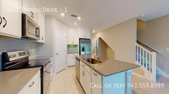 Building Photo - 5621 Tripoli Dr