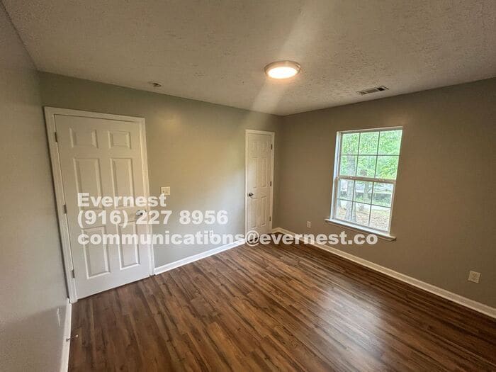 Primary Photo - Charming 4-Bedroom Home with Modern Amenit...