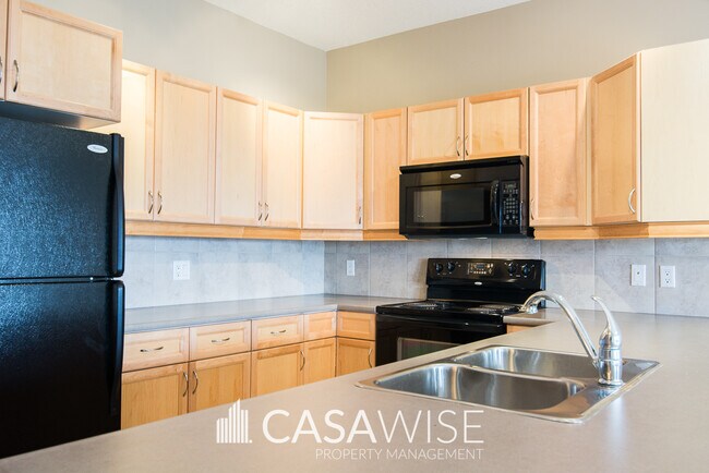 Photo du bâtiment - 160-160 Magrath Rd NW
