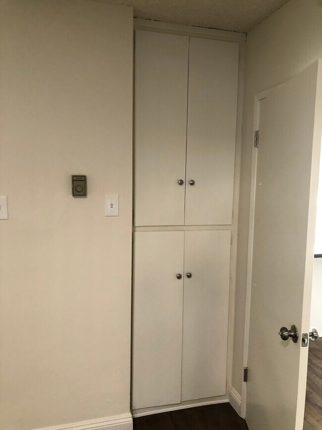 Storage cabinets in bedroom - 7117 Rugby Ave