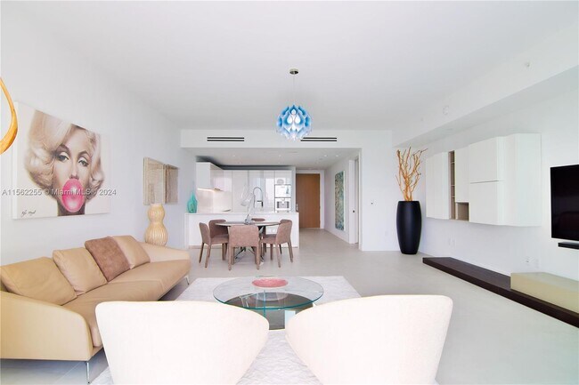 Building Photo - 10201 Collins Ave