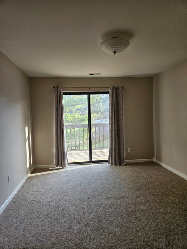 Master bedroom with deck entrance - 895 S Pontiac Trail