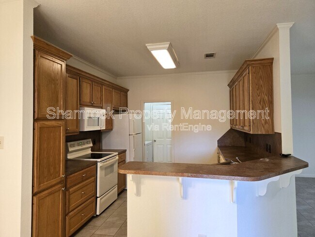 Building Photo - 6830 Edmond Ave
