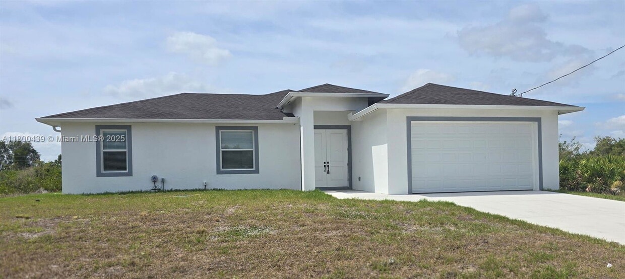 Photo - 2809 64th Street West, Lehigh Acres, FL 33971 - 3 BR 2 BA single-family home