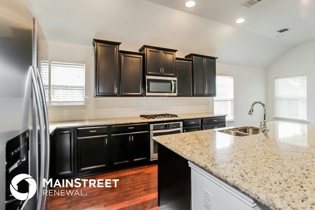 Building Photo - 6709 Roaring Creek