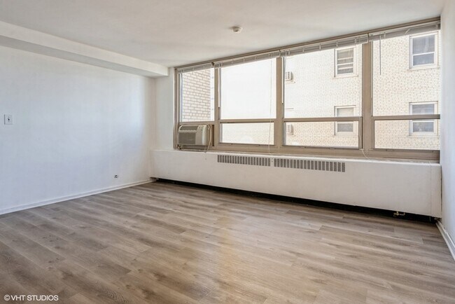 Building Photo - Be the first to enjoy the just completed u...