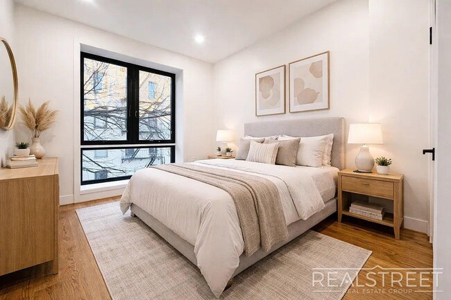 Building Photo - Modern Williamsburg Apartment w/ W/D, Central A/C & Shared Roof Deck