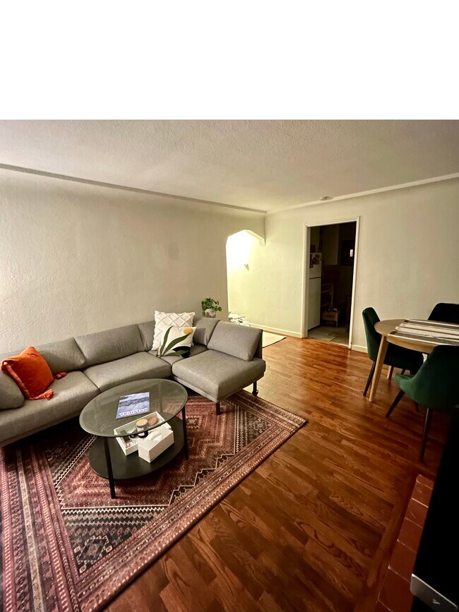 Living room facing kitchen and hallway - 2020 N Alder St