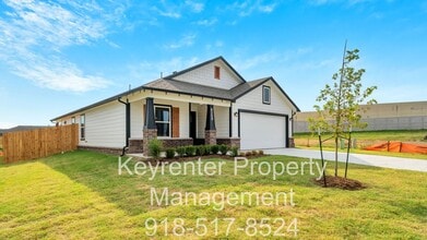 Building Photo - 9309 N 115th E Ave