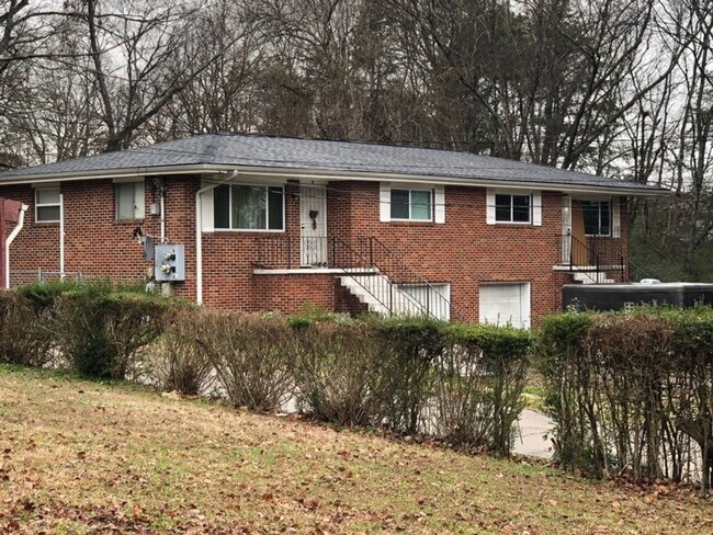 Building Photo - 4522 Tomben Lane Unit A